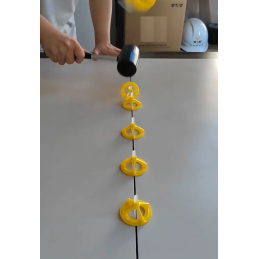 Uchwyt do systemu poziomowania 2 mm płytek glazury  - 100 szt